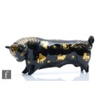 A Wedgwood Taurus the Bull, after the original by Arnold Machin, with gilt signs of the zodiac
