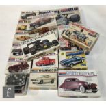 A collection of kit built plastic model cars, mainly Monogram but includes others, along with