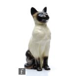 A large Beswick Fireside model of a Siamese cat, model 2139, height 35cm.