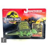 A Kenner Jurassic Park Dimetrodon action figure with Dino Strike Clamping Jaws, carded, card S/D.