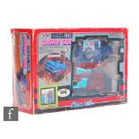 A 1980s GiG (Takara) Cosmo-car, plastic transforming robot toy, boxed.