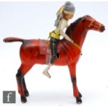 A 1950s Italian Quercetti Gigante Galoppa clockwork horse and rider, the moulded plastic wheeled