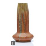 An early 20th Century Denbac French Art Nouveau vase of compressed form with a large cylinder