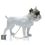 A late 19th to early 20th Century continental night light modelled as a bulldog with inset glass
