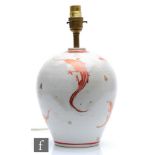 A later 20th Century studio pottery table lamp by Jonathan Chiswell Jones decorated with ruby lustre