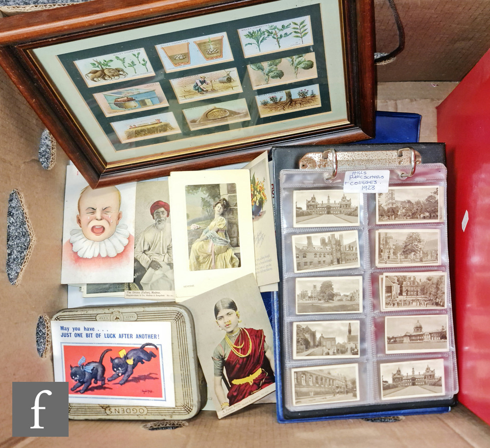 A collection of various cigarette cards contained in vinyl albums, loose postcards and stamp PQ