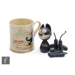 A Schoenhut Felix the Cat, wooden, fully jointed, with leatherette ears, Felix to chest, and Pat