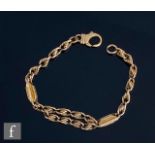 A 9ct rope twist and fetter link bracelet, weight 22g, length 22cm, terminating in lobster clasp,
