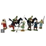 A collection of Britains toy soldiers, to include two mounted Arabs, two marching Arabs, and an Arab