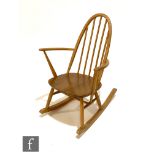 An Ercol model 428 Quaker rocking chair, with elm seat and beech bentwood frame, designed by Luciano