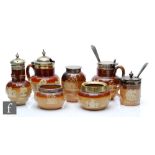 A small collection of assorted salt glazed stoneware cruet pieces comprising open salts, mustard