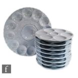 A mid 20th Century Sarreguemines oyster set comprising one large serving plate and eight side