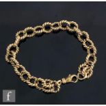 A 9ct hallmarked rope twist bracelet comprising twenty five circular links terminating in lobster