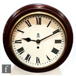 A GPO ERII mahogany cased circular wall clock, white enamelled dial, stamped on door edge 129,