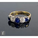 An early 20th Century 18ct  sapphire and diamond five stone ring, claw set stones, weight of each