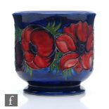 A Moorcroft footed jardiniere decorated in the Anemone pattern, impressed mark and initialled in