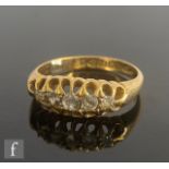 An early 20th Century 18ct hallmarked five stone boat shaped ring, weight 3.6g, ring size N, Chester