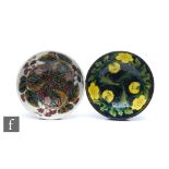 Two Moorcroft Pottery footed bowls, the first decorated in the Buttercup pattern, the second in