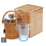 A 1960s chrome covered wicker ice bucket, a square wicker cased basket and a pale blue glass ice