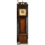 A 19th Century oak and mahogany cross-banded longcase clock with eight day striking movement, the 13