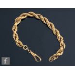 A 9ct solid link rope twist bracelet, total weight 28.5g, length 19cm, terminating in swivel clasp.