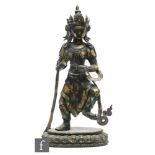 A Sino-Tibetan gilt metal figure of Amitayus, cast in standing position wearing robes and pectoral