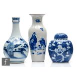 A collection of Chinese blue and white vases, to include a prunus jar and cover, height 16cm, a