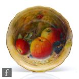 A Royal Worcester Fallen fruits footed bowl decorated by Ricketts with hand painted apples and