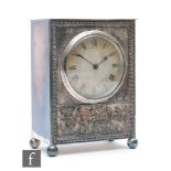 An Edwardian plated cased mantle clock by Edmund Crouch Worthing, circular matted centre over a