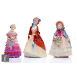 Three Royal Doulton figurines comprising Paisley Shawl HN1988, Granny's Shawl HN1642 and The