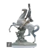 A large Lladro figure of a man on a gentleman, model 4515 designed by Fulgencio Garcia, printed