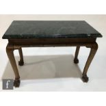 A George I style green veined marble top mahogany serving table, on shaped frieze cabriole legs