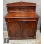 A 19th Century mahogany chiffonier, the architectural panel back over two frieze drawers and