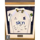 A Warwickshire CCC signed shirt with presentation plaque to David Lloyd Solihull Cranmore, 90cm x