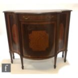 An Edwardian crossbanded and line inlaid mahogany serpentine side cabinet by Edwards and Roberts,
