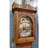 A late 18th to early 19th Century oak longcase with eight-day movement, the dial with moon phase,