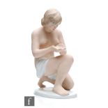 A post war Wallendorfer figure of a kneeling semi-nude female with a white scarf covering her