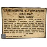 A cast iron bridge restriction notice for Lancashire & Yorkshire Railway, Hunts Bank, Manchester,