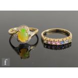 A 9ct hallmarked water opal and diamond ring, with a similar multi stone half eternity, total weight