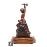 A bronze figure, 'Self-made Man', by Bobbie Carlyle, signed and dated '97, on oak base, overall