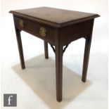 A George III oak and mahogany crossbanded side table fitted with a single frieze drawer on square
