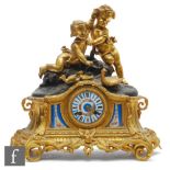 A late 19th Century French gilt mantle clock, the sevres style panel dial below a two amorini and