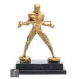 A gilt painted bronze depicting Rudolf Nureyev wearing a leotard, on black marble base, overall