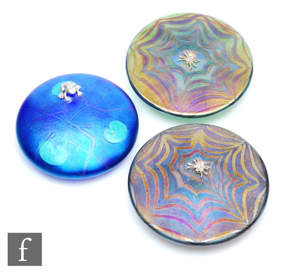 A contemporary Heron Glass paperweight of compressed ovoid form, modelled as a stylised pond with
