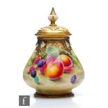 A Royal Worcester Fallen Fruits shape H291 vase with spire cover panel decorated by Owen with hand