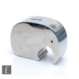 A contemporary stainless steel Georg Jensen moneybox, modelled as a stylised elephant, printed