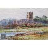 H. J. LOCKLEY (LATE 19TH CENTURY) - A church viewed from a water meadow, watercolour, signed,
