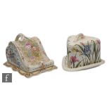 Two late 19th Century cheese dishes and covers each with transfer floral decoration with gilt