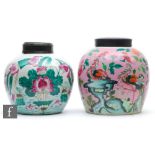 Two Chinese famille rose vases, each of ovoid form, the first with a pink ground detailed with