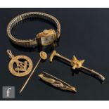 A 9ct fox's head bar brooch, a similar diamond set example, a Masonic fob total and a stick pin,